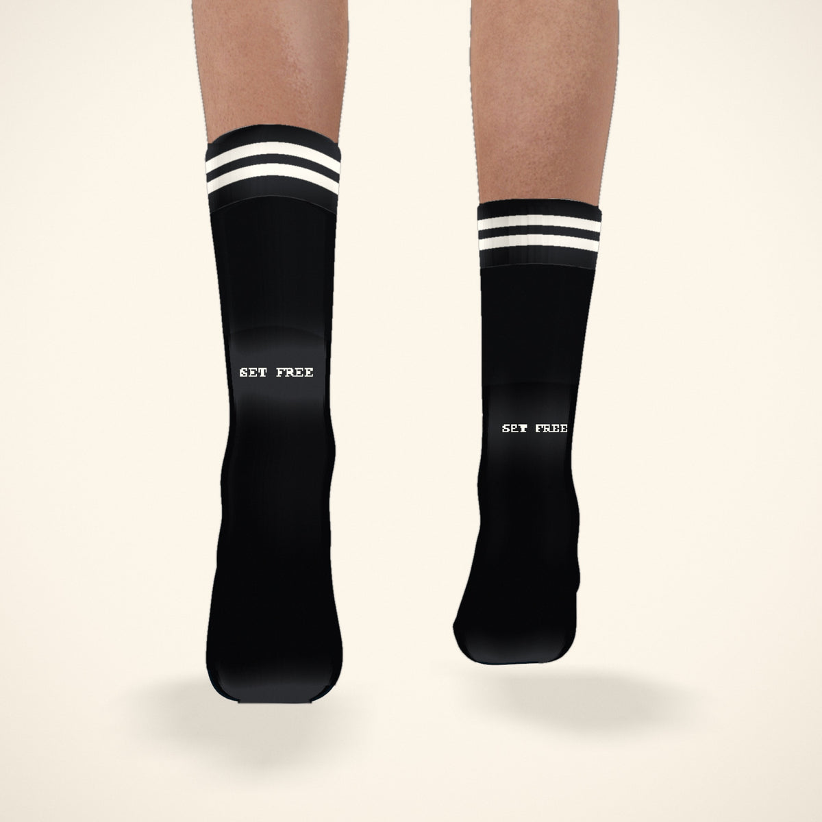 Back of the Infinite Grace concept — SET FREE knit in white across the back of the leg, for Romans 8:2